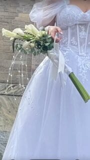 💍✨ A timeless bridal dream…
A delicate harmony of calla lilies, tulips, and baby white roses, designed to whisper elegance and purity. This bridal bouquet, paired with a matching corsage, celebrates love in its most graceful form — soft, radiant, and eternal. 🤍🌿

#BridalBouquet #WeddingFlorist #WeddingFlowers #FloralDesign #FloralArtistry #LuxuryFlorals #WhiteBouquet #RomanticFlorals #BouquetInspiration #FlowerLover#EustisFL #EustisMarket #EustisFlorist #LakeCountyFL #CentralFloridaFlorist #EustisWeddings #MountDoraFL #TavaresFL #LeesburgFL #FloridaBride #CentralFloridaWeddings#HandcraftedBouquet #MadeWithLove #CustomFlorals #BoutiqueFlorist #FlowersOfEustis #FloralBoutique #FlowerDesignStudio #LoveInBloom